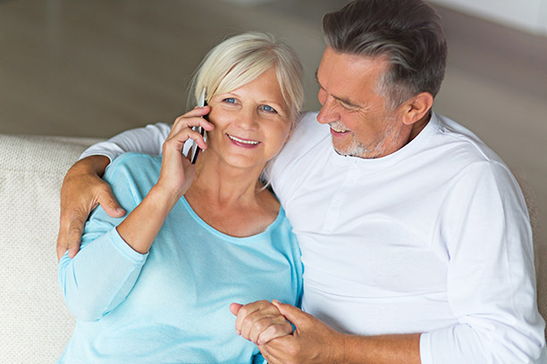 Photo of couple calling about Medicare insurance